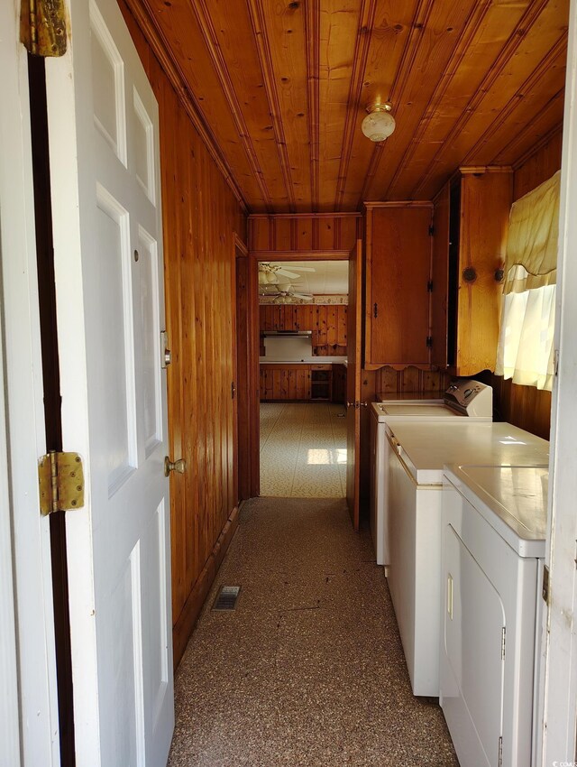 1375 Kenny Jordan Rd, Tabor City, NC 28463 - laundry room with wooden walls, visible vents, cabinet space, wood ceiling, and independent washer and dryer