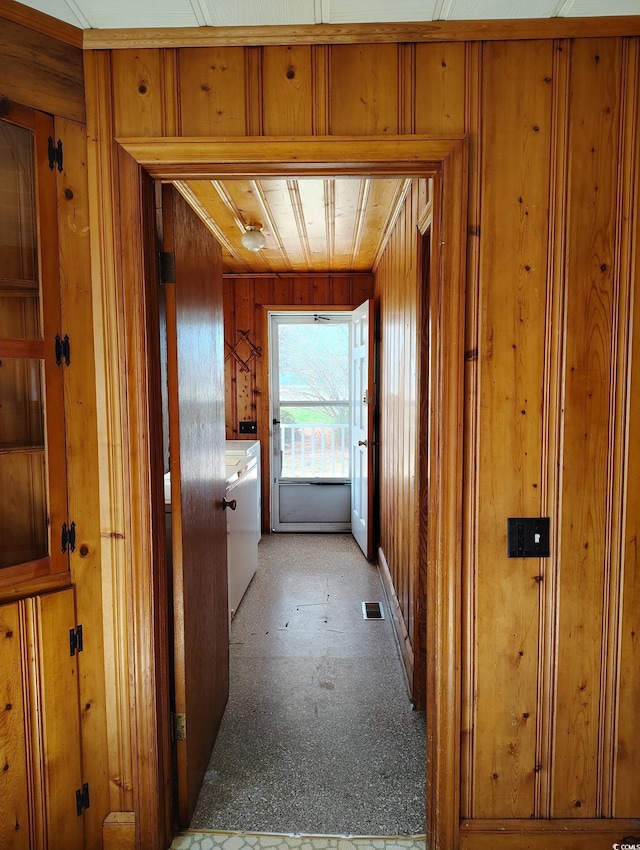 1375 Kenny Jordan Rd, Tabor City, NC 28463 - hallway with visible vents and wood walls