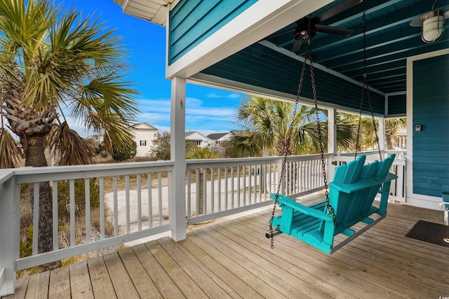 wooden terrace with ceiling fan