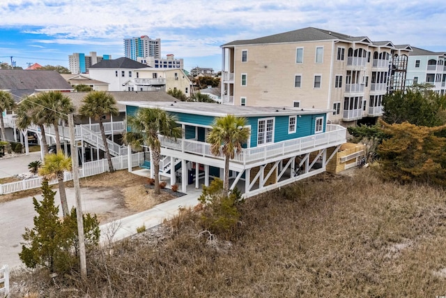 exterior space featuring stairs and driveway