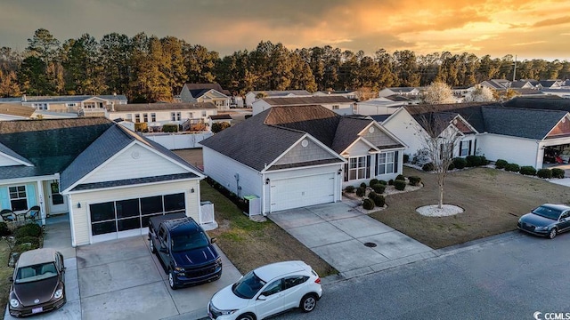 aerial view at dusk with a residential view