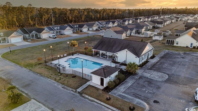 aerial view at dusk with a residential view