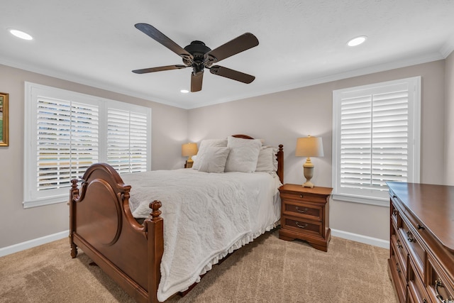 bedroom featuring light carpet, baseboards, and ornamental molding