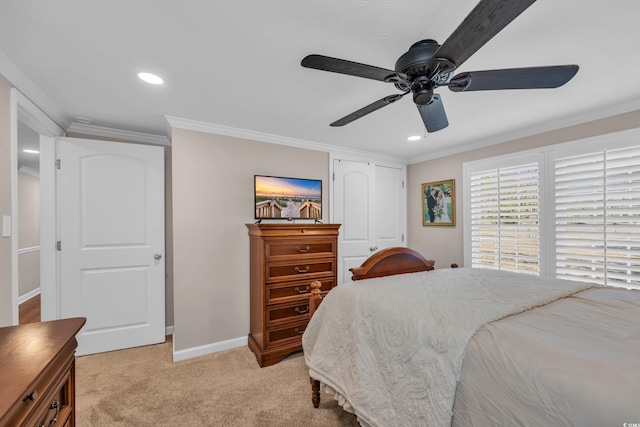 bedroom featuring light carpet, recessed lighting, crown molding, and baseboards