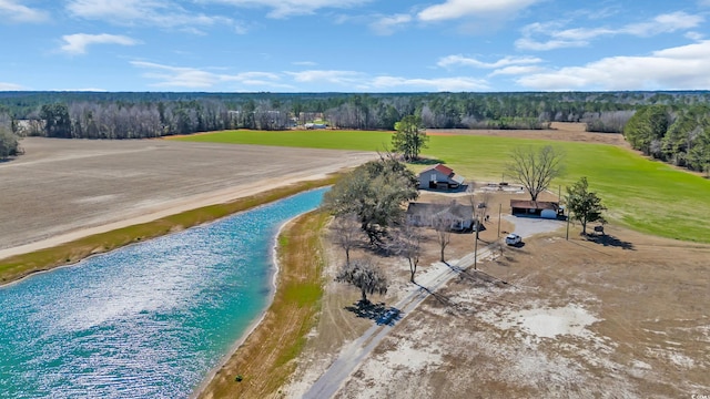 birds eye view of property with a view of the beach and a water view