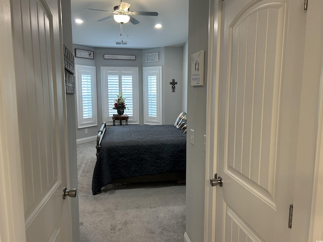 bedroom featuring visible vents, recessed lighting, carpet, baseboards, and ceiling fan