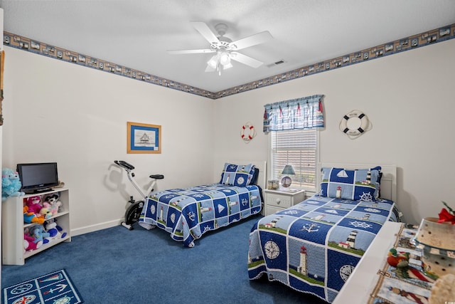 carpeted bedroom with visible vents, baseboards, and ceiling fan