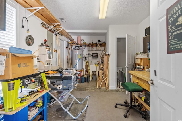 storage room with water heater and electric water heater