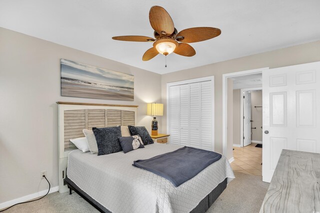 bedroom with baseboards, light carpet, and a ceiling fan