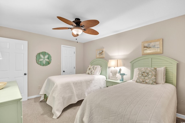 bedroom with baseboards, carpet floors, and ceiling fan