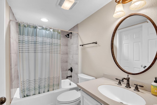 bathroom with shower / bathtub combination with curtain, toilet, and vanity