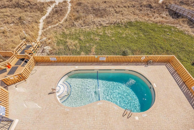 community pool featuring a patio