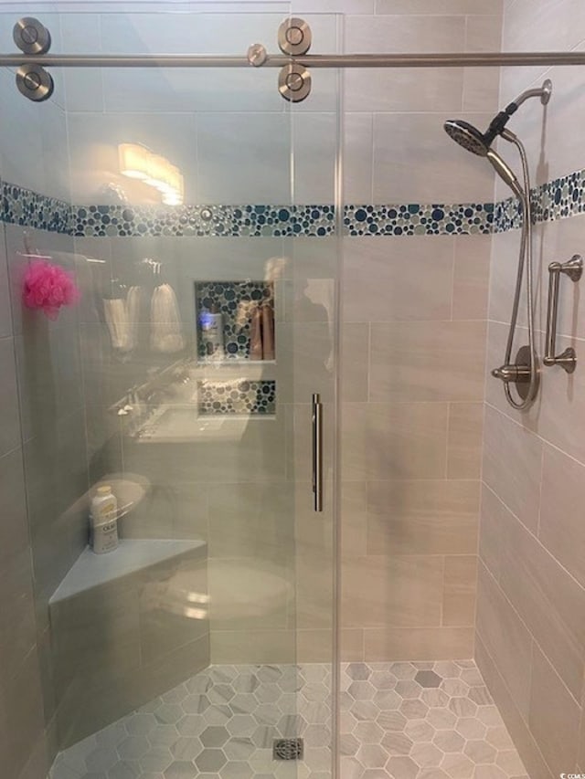 bathroom featuring a stall shower