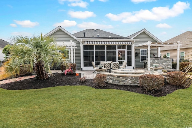 back of house featuring an outdoor fire pit, a lawn, a sunroom, a patio area, and a pergola