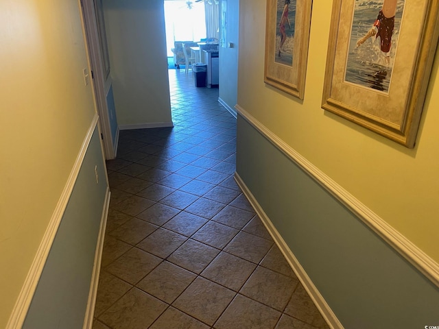1625 S Ocean Blvd Unit 802, North Myrtle Beach, SC 29582 - hallway with dark tile patterned floors and baseboards