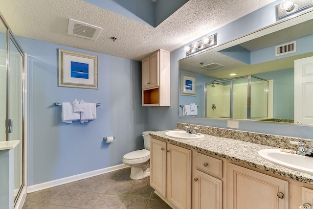 1625 S Ocean Blvd Unit 802, North Myrtle Beach, SC 29582 - bathroom featuring a stall shower, double vanity, baseboards, toilet, and tile patterned flooring