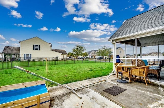 view of yard with a patio and a fenced backyard