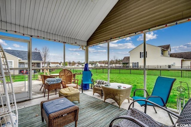 sunroom with vaulted ceiling