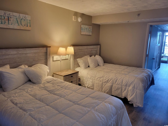 bedroom featuring wood finished floors