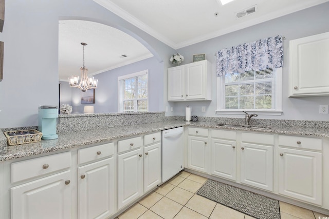 kitchen with visible vents, ornamental molding, a sink, white cabinets, and dishwasher