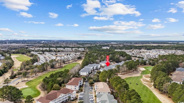 bird's eye view with a residential view and view of golf course