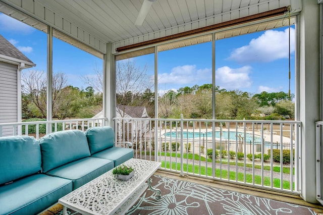 sunroom / solarium featuring plenty of natural light