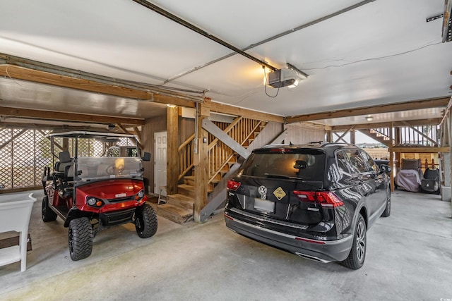 garage featuring a garage door opener