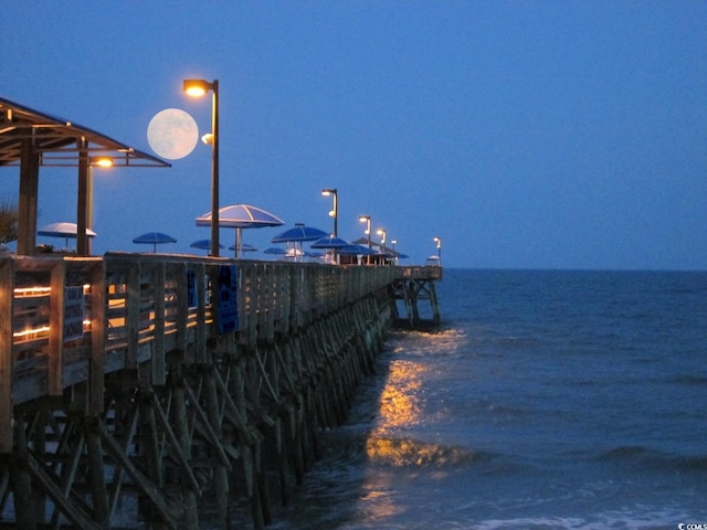 view of dock featuring a pier and a water view