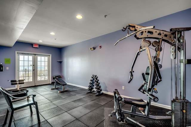 workout area featuring recessed lighting, french doors, and baseboards