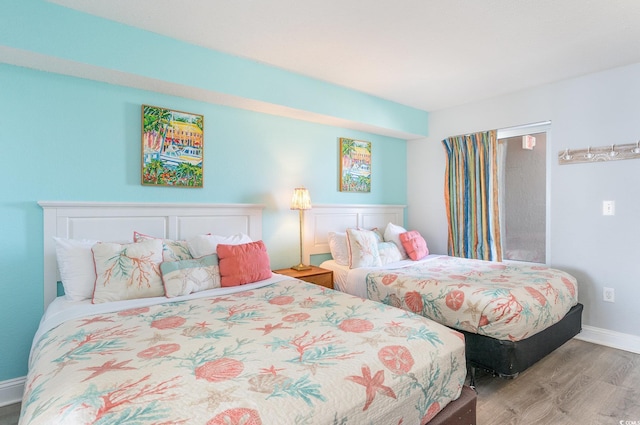 161 Seawatch Dr Unit 808, Myrtle Beach, SC 29572 - bedroom with baseboards and wood finished floors