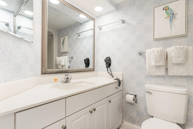 161 Seawatch Dr Unit 808, Myrtle Beach, SC 29572 - bathroom with tile walls, recessed lighting, toilet, and vanity