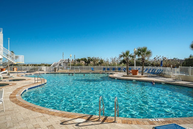 161 Seawatch Dr Unit 808, Myrtle Beach, SC 29572 - community pool with a patio and fence