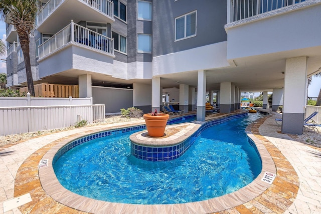 161 Seawatch Dr Unit 808, Myrtle Beach, SC 29572 - view of swimming pool with a patio area and fence
