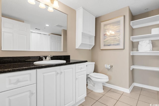 full bath featuring visible vents, toilet, tile patterned flooring, baseboards, and vanity