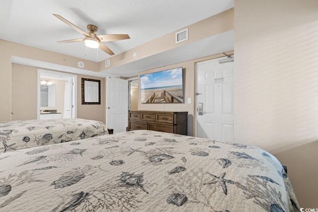 bedroom with a ceiling fan and visible vents