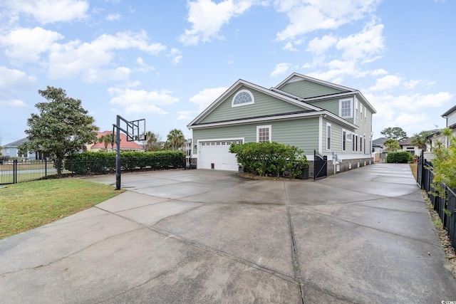 view of side of property with driveway