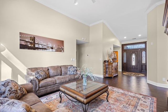 living area featuring crown molding, baseboards, wood-type flooring, a high ceiling, and recessed lighting