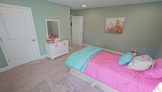 bedroom featuring baseboards, light colored carpet, and recessed lighting