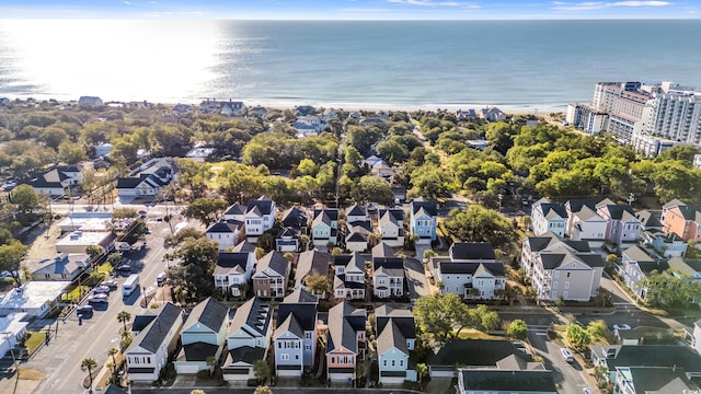 birds eye view of property featuring a water view and a residential view