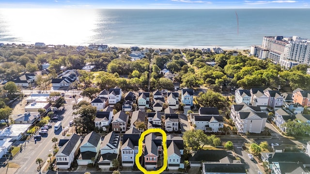 birds eye view of property featuring a residential view and a water view