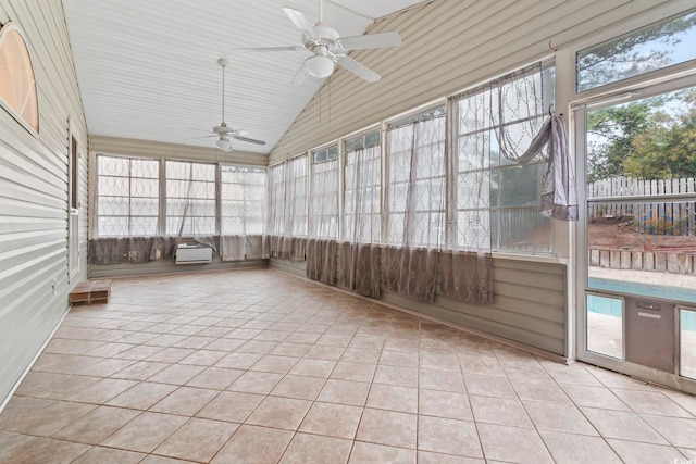 unfurnished sunroom featuring ceiling fan and vaulted ceiling