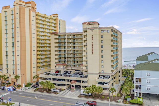 view of building exterior featuring a water view