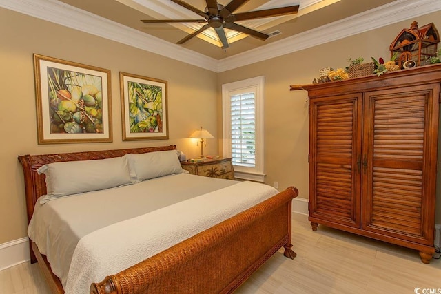 bedroom featuring ceiling fan, baseboards, visible vents, and ornamental molding