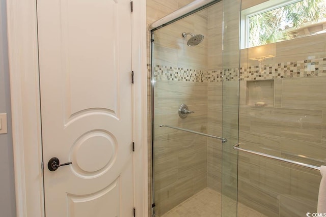 full bath featuring a stall shower