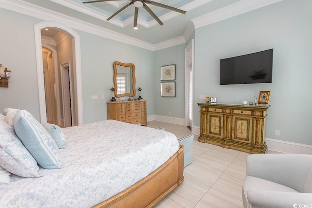 bedroom featuring light tile patterned floors, baseboards, arched walkways, ceiling fan, and ornamental molding