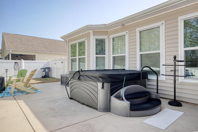 view of patio / terrace featuring area for grilling and fence