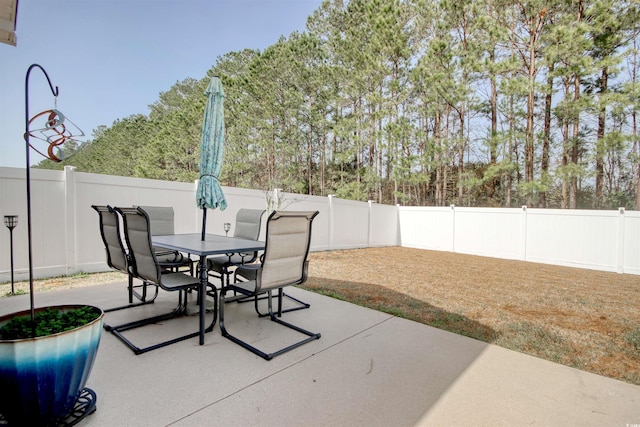 view of patio / terrace with outdoor dining area and a fenced backyard