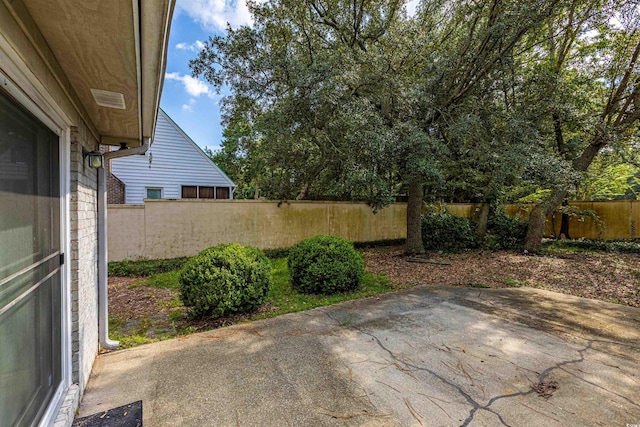 409 65th Ave N, Myrtle Beach, SC 29572 - fenced backyard with a patio