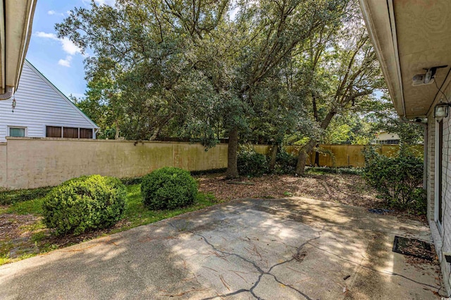 view of patio featuring a fenced backyard