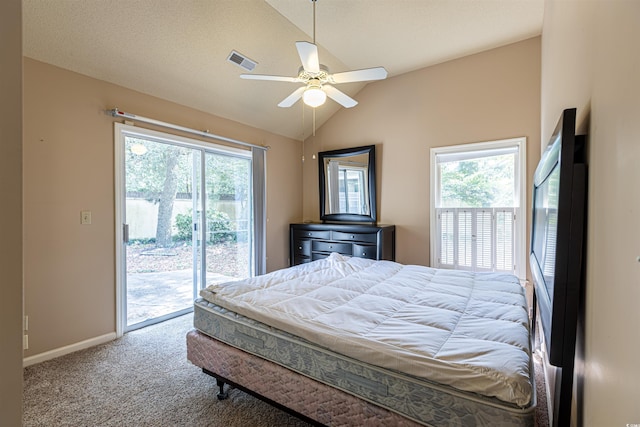 bedroom featuring visible vents, multiple windows, carpet, access to exterior, and vaulted ceiling